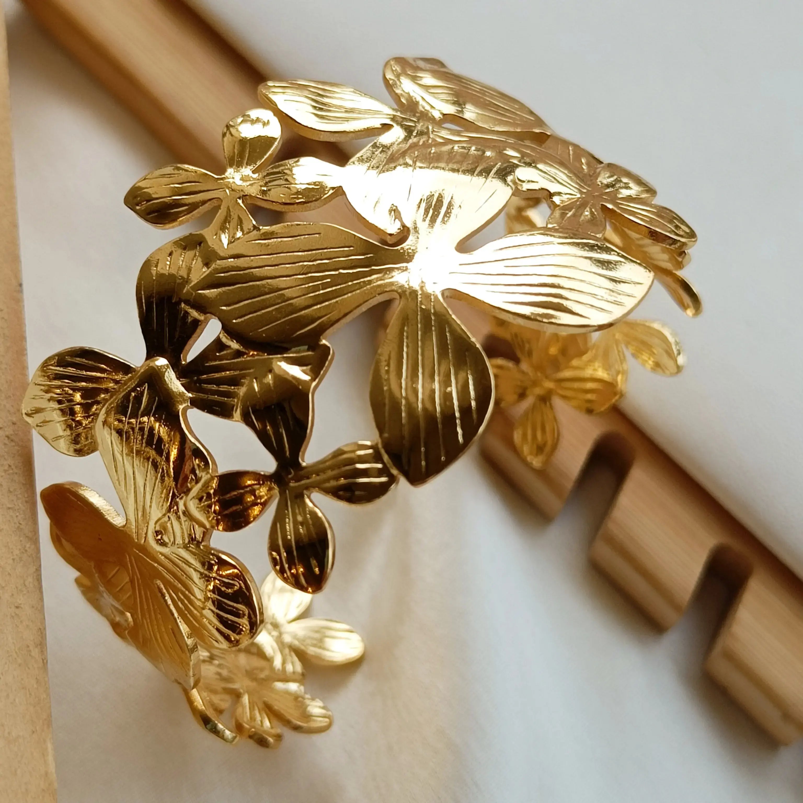 Golden Textured Flower Broad Bracelet